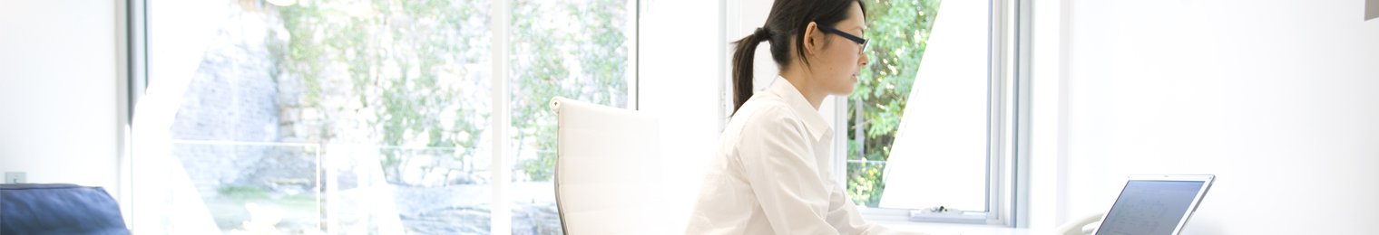 Woman using a computer Woman using a computer