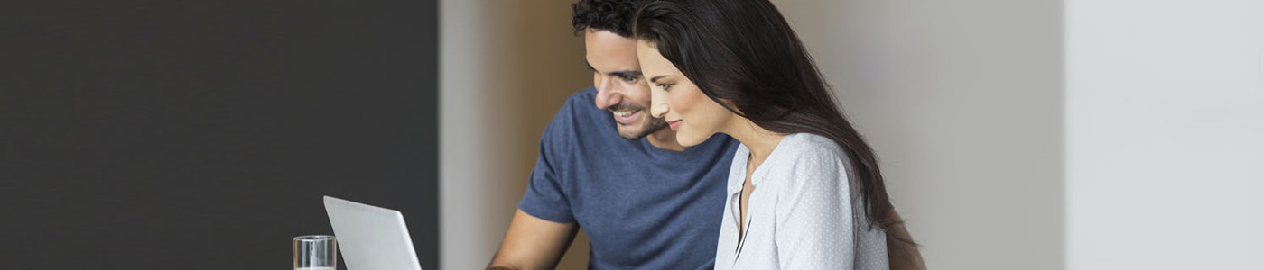 Man and woman using laptop Man and woman using laptop
