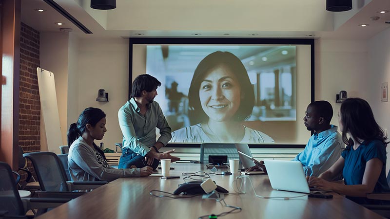 Team conducting a telephony meeting Team conducting a telephony meeting