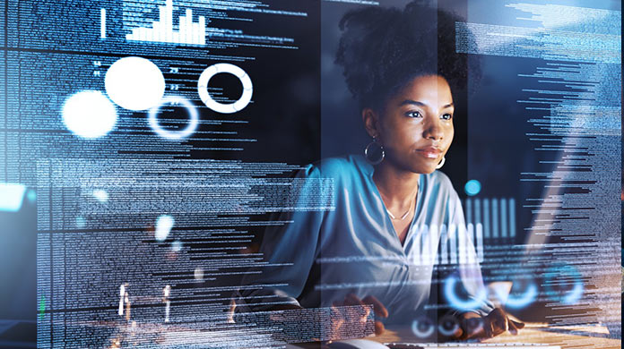 Woman in the office browsing the tablet computer Woman in the office browsing the tablet computer