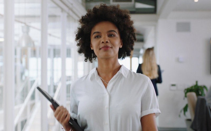 professional woman walking in the office