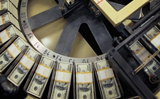 Dollars coming out of the mint Dollars coming out of the mint