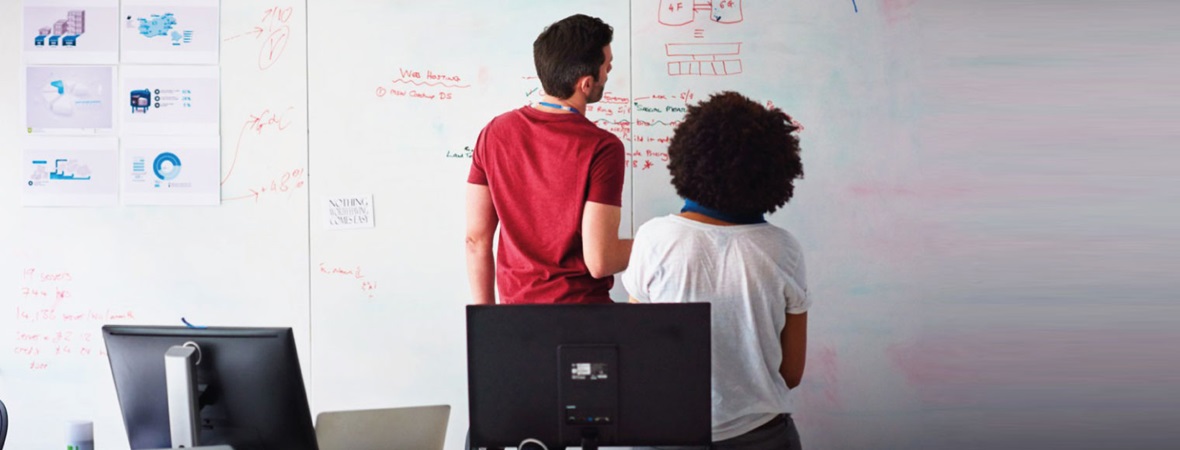 A man and a woman discussing about their startup growth