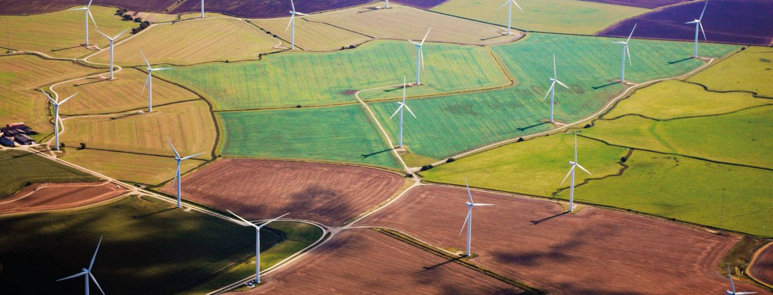 Windmills harnessing green energy for sustainable finance